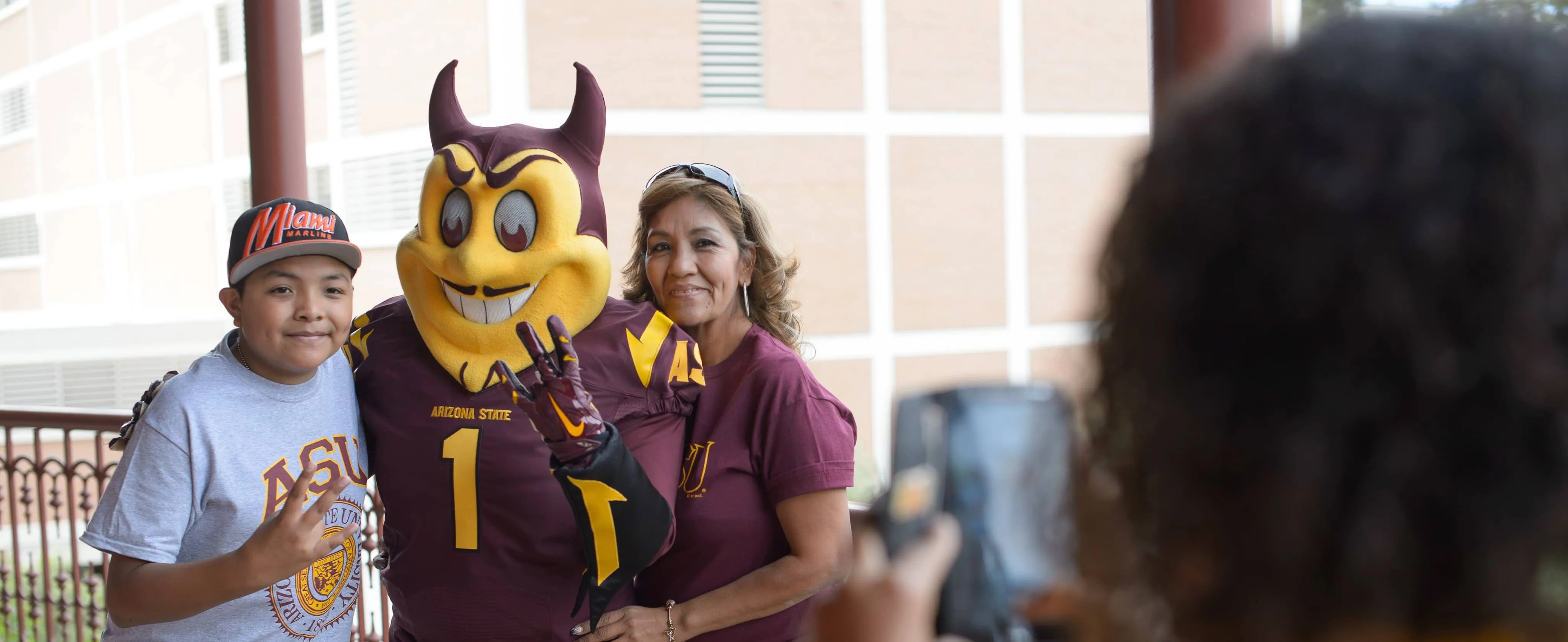 Spakt posing with fans